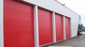 Porte sectionnelle pour collectivité